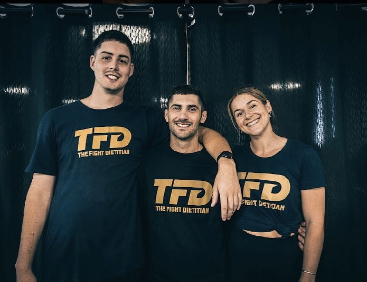 Jordan Sullivan with two clients