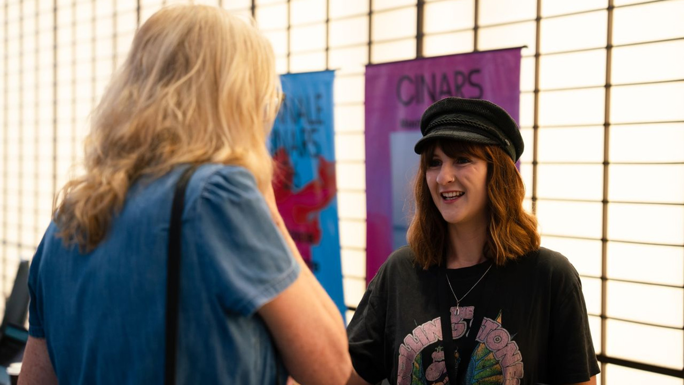Producer, Georgia Landre-Ord meets an attendee at the Australian Performing Arts Market