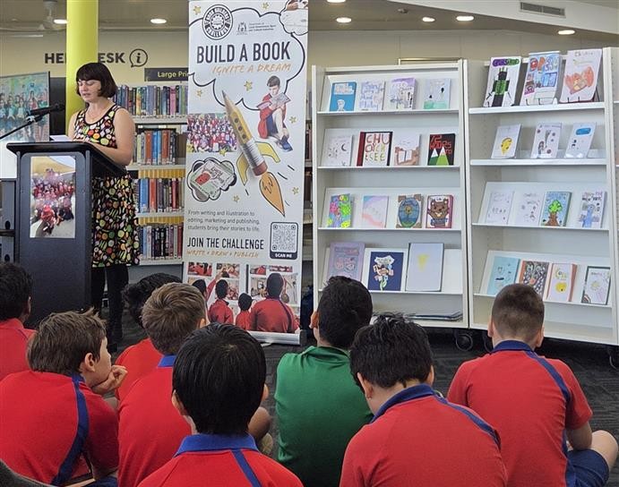 Program founder and CEO of Book Builders Challenge Kristy Nita Brown speaks at the 2025 book launch at Victoria Park Library.