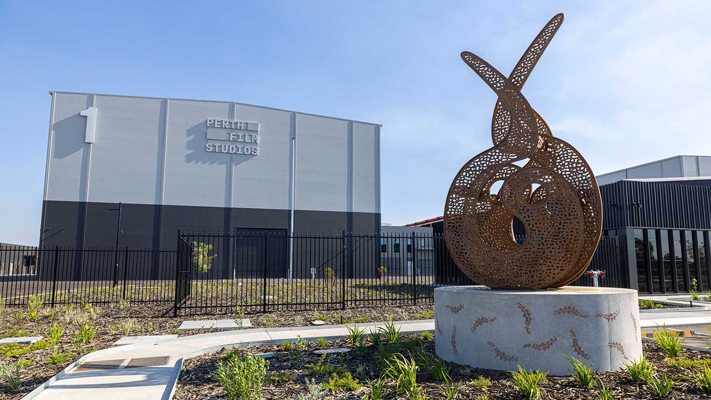 Outside of the Perth Film Studios in front of a sculpture