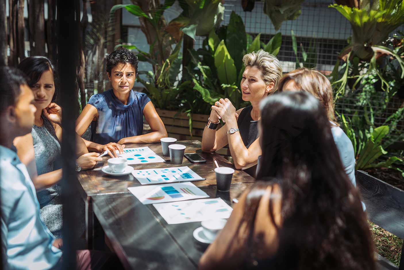 A person interacting in a group discussion
