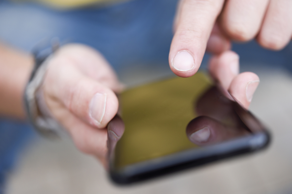 Closeup of a person using a smartphone