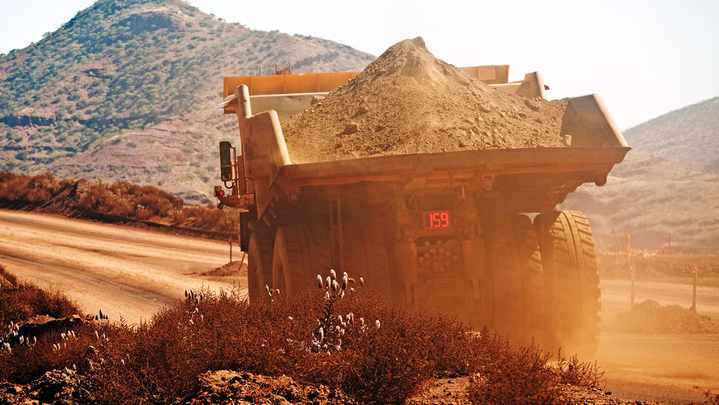 Rear view of a loaded haul truck on a mine site