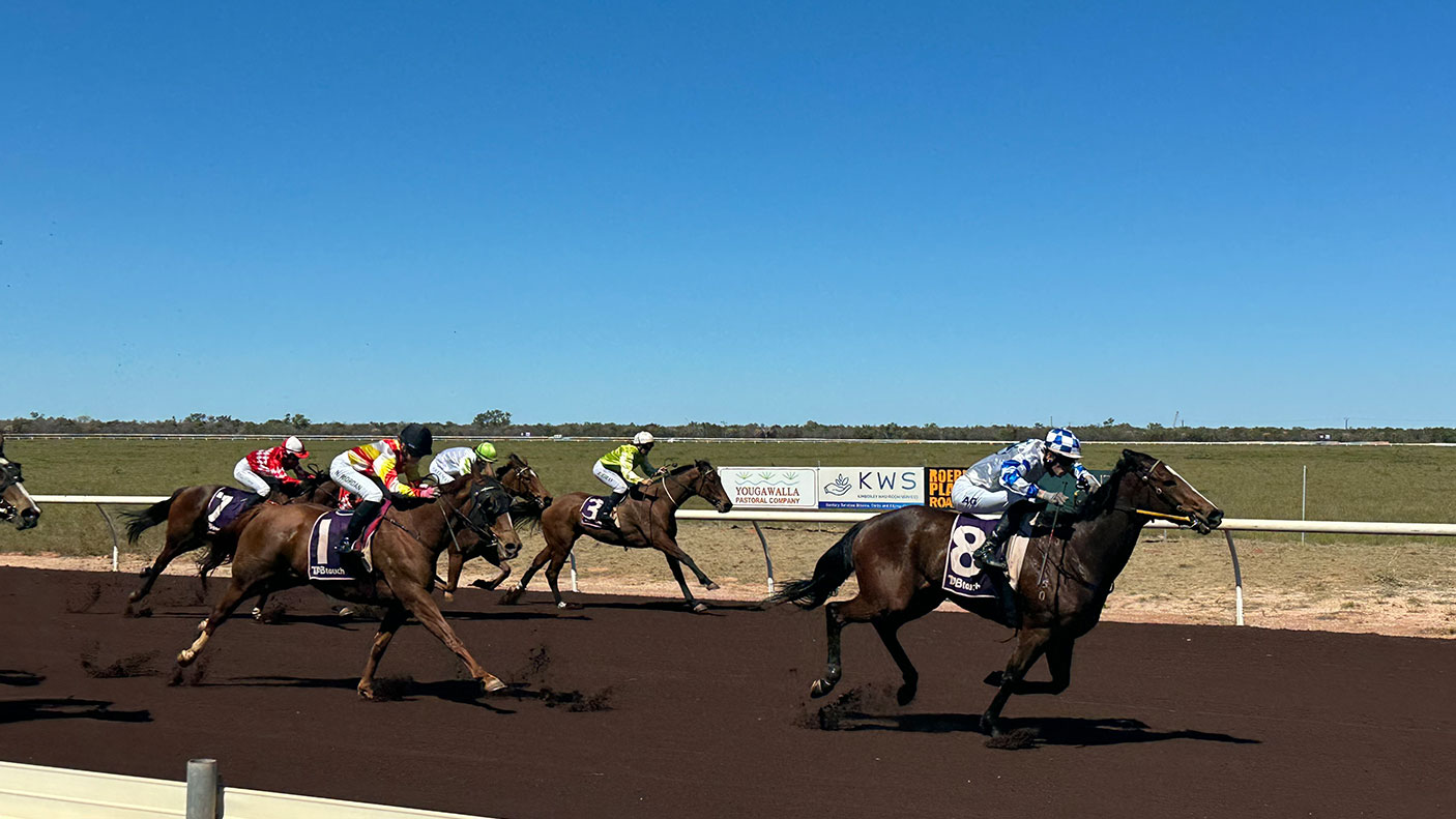 Horses and jockeys on the track at the Broome Cup, 16 August 2025
