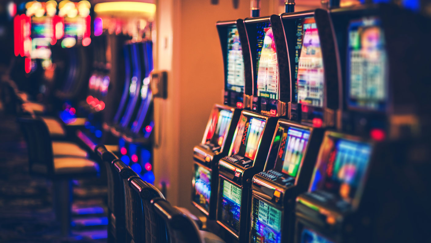 A row of poker machines inside a casino