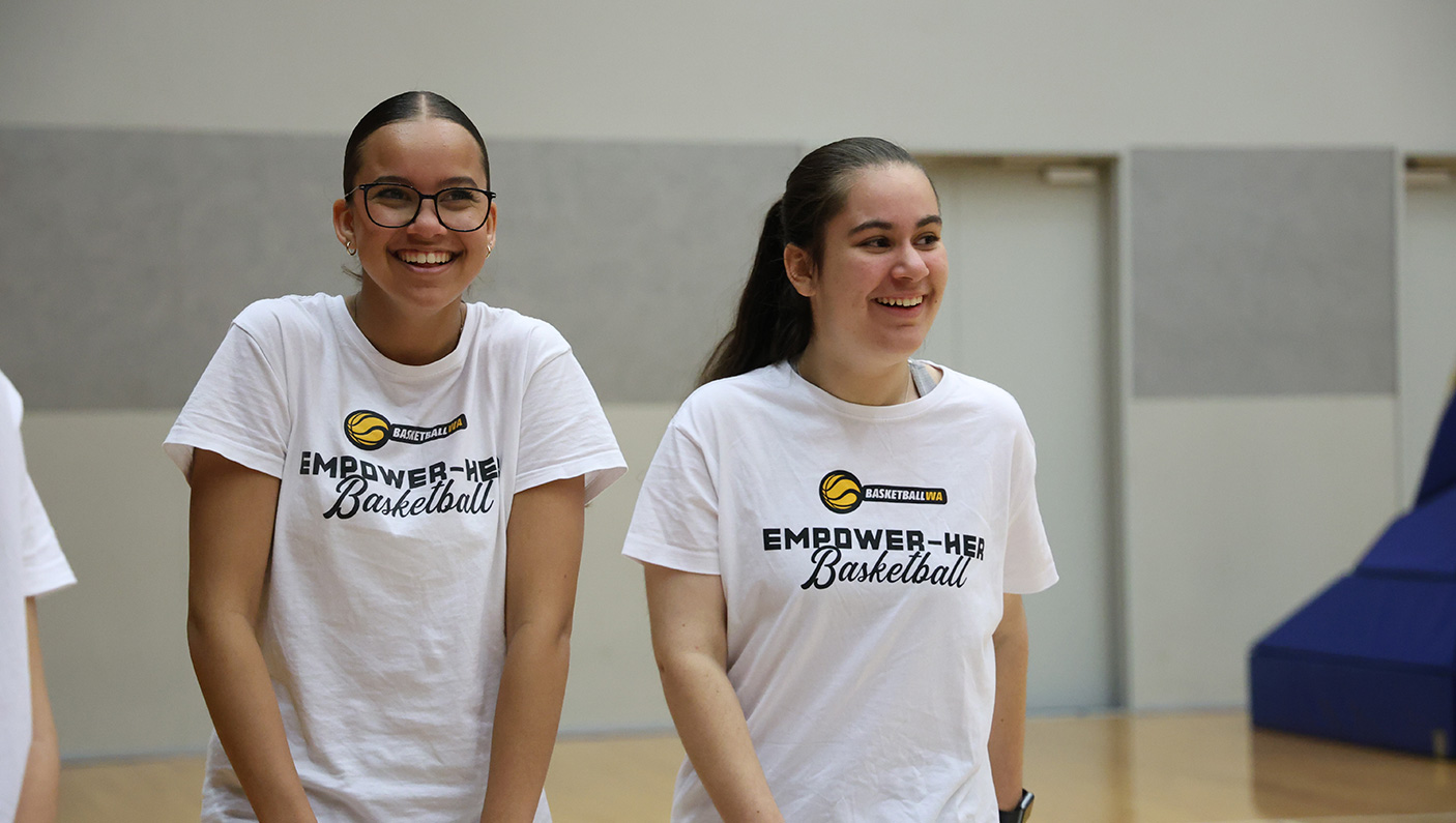 2 women on a basketball court