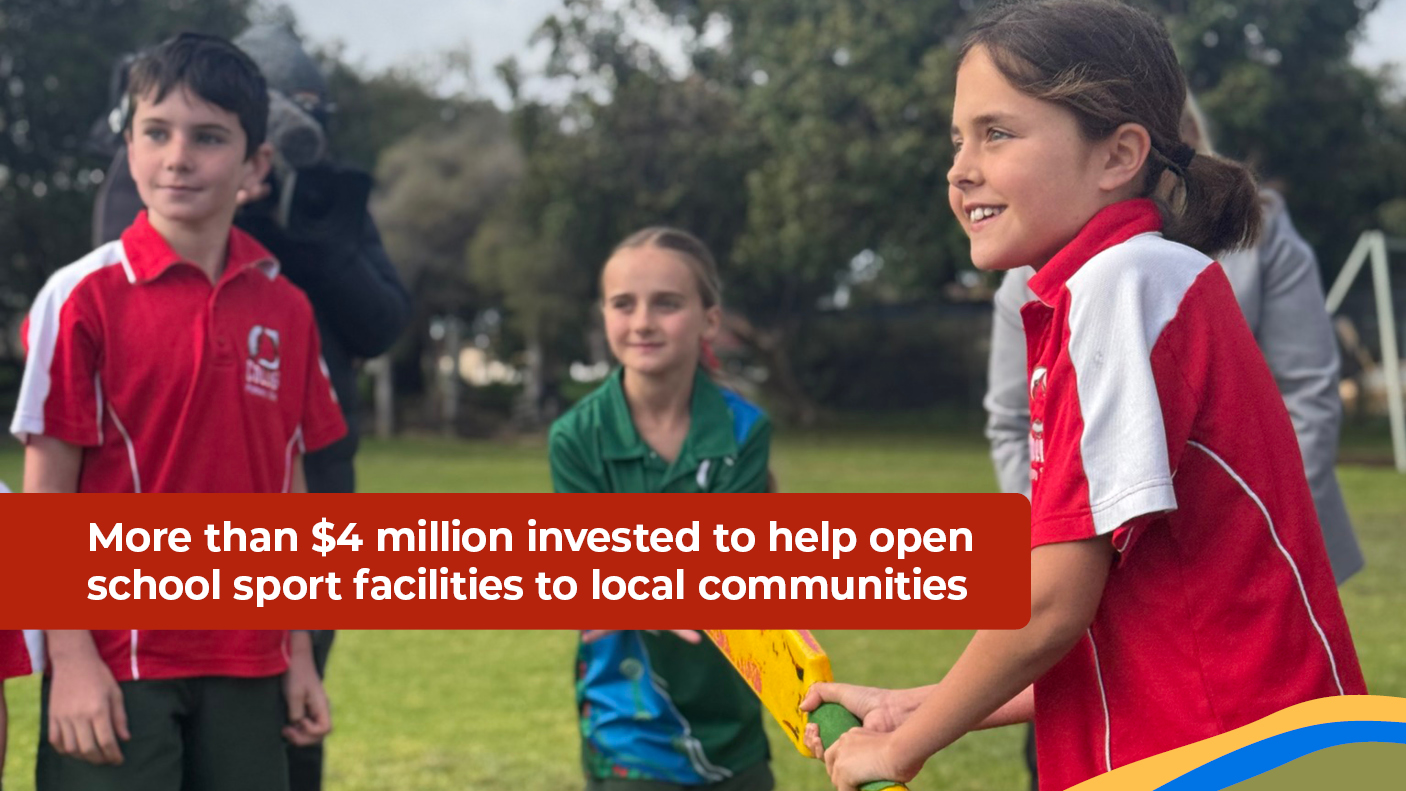 Three school age children on a sporting field