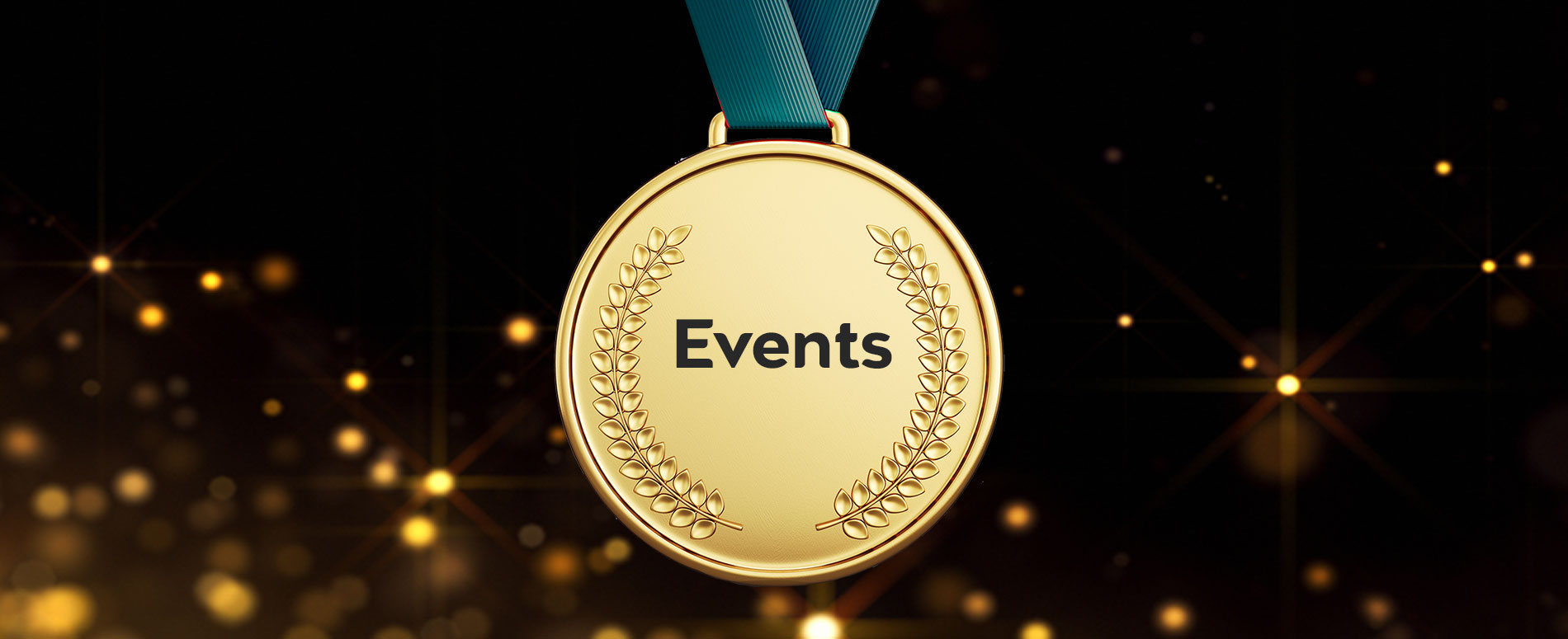 Gold medal with word events engraved in the centre