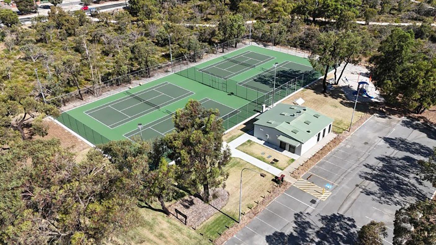 An aerial view of tennis courts at Montrose Park