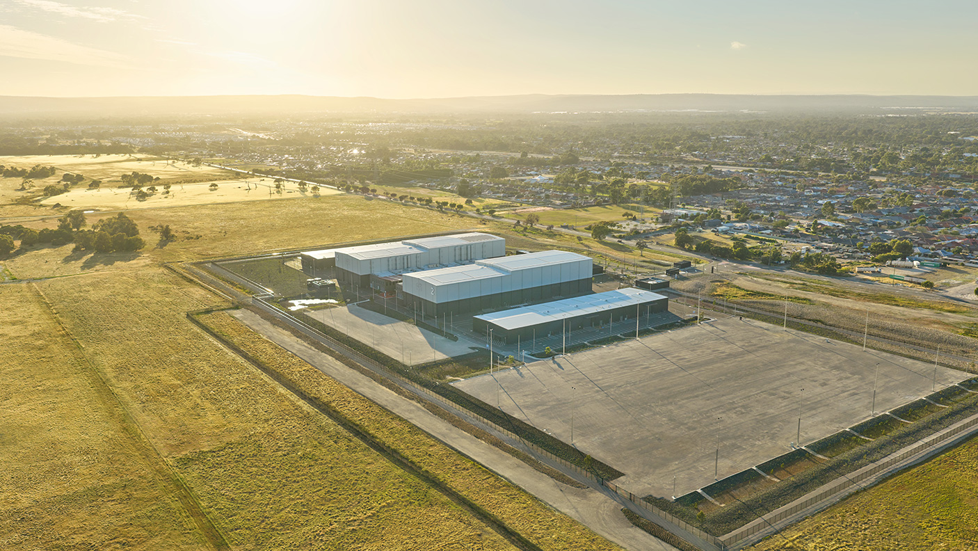 An aerial photo of the 4 buildings and large car park at the Perth Film Studios